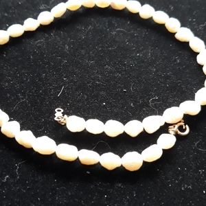 Ladies fresh water pearls and 14k gold  clas
